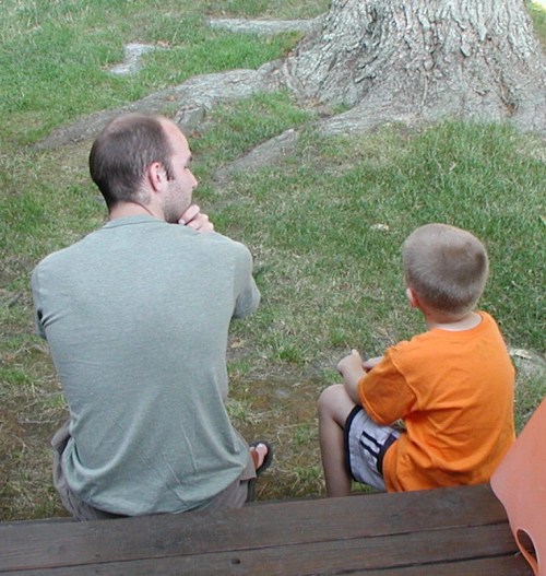 A porch step is a good place to get to know your younger or older cousin.